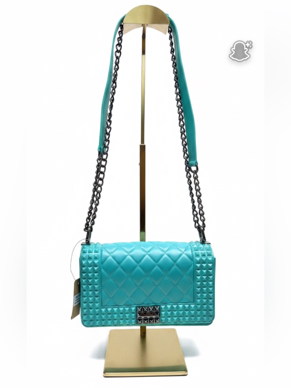 Aqua blue jelly purse with a black chain strap